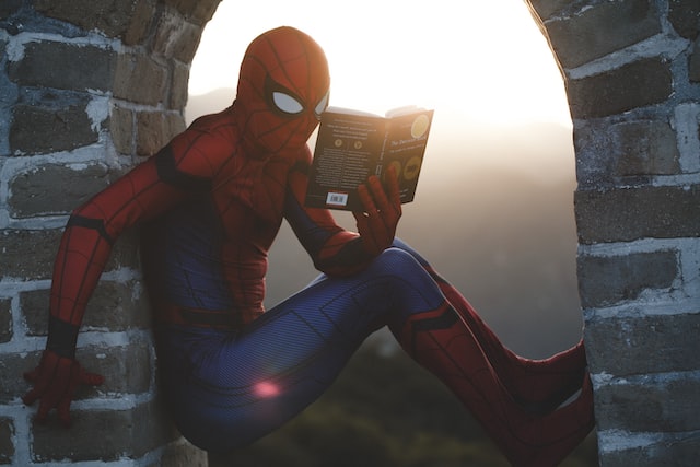 spiderman reading book